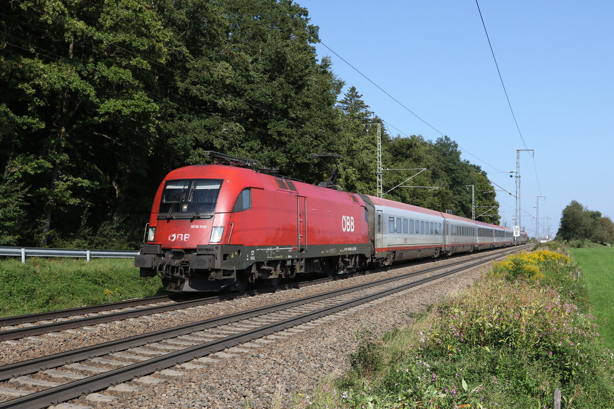 1016 035 mit einem  EC  auf dem Weg nach M�nchen. Aufgenommen am 4. September 2024 bei Hufschlag/Traunstein.