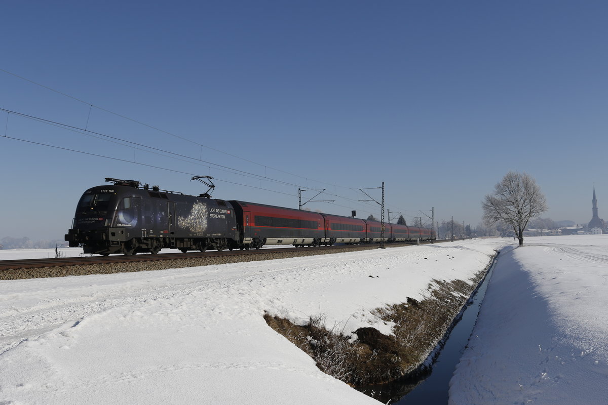 1116 158-7  Licht ins Dunkel  mit einem Railjet aus Salzburg kommend am 29. Januar 2017 bei �bersee am Chiemsee.
