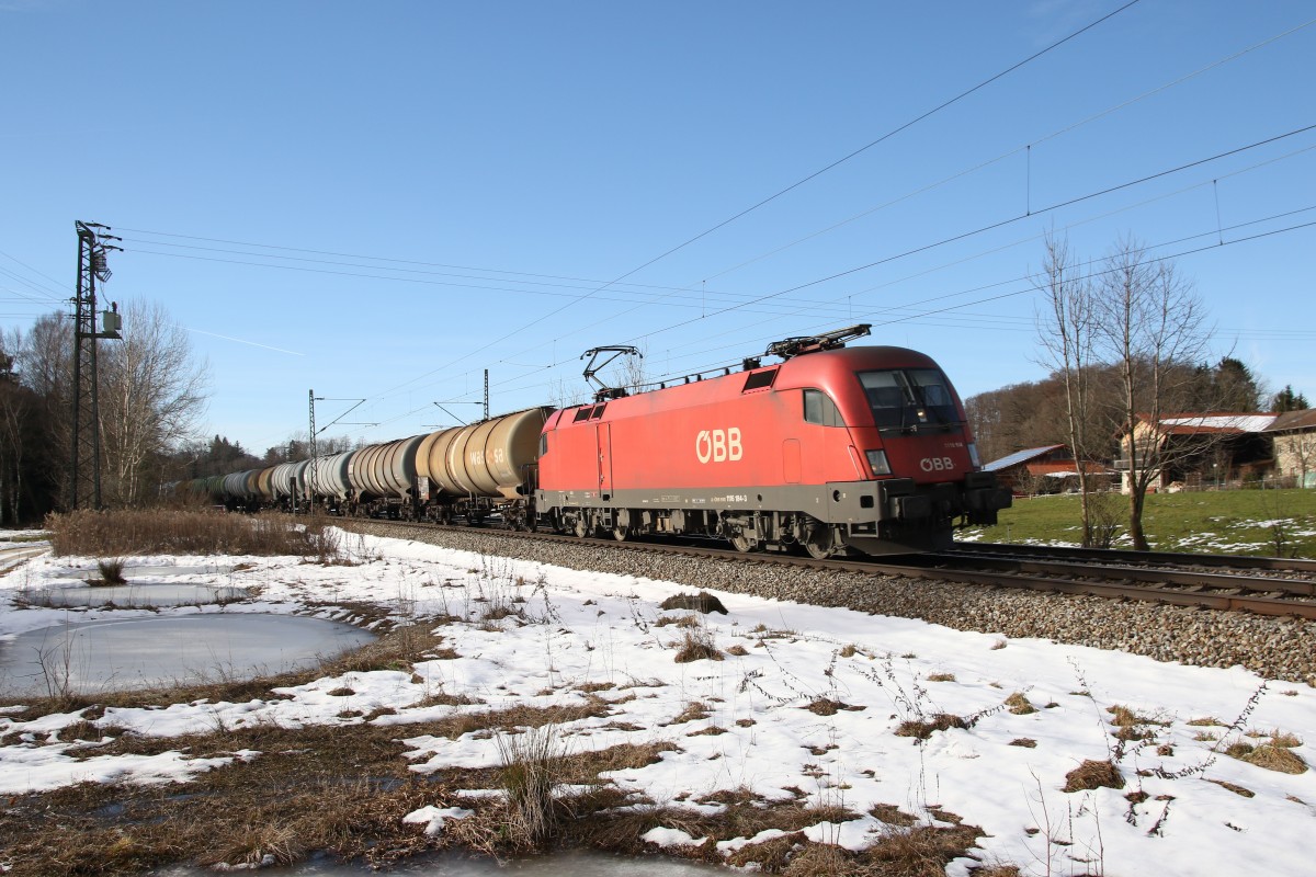 1116 184-3 war am 6. Januar 2015 bei �bersee mit einem Kesselwagenzug in Richtung Salzburg unterwegs.