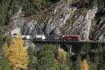 RhB Ge 4/4 II 615  Fairtiq  war am 27. Oktober 2021 bei  Muot  in Richtung  Samedan  unterwegs.